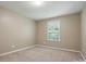 Neutral bedroom with carpet and one window featuring blinds to let light in at 3106 Crosswind Dr, Fort Mill, SC 29707