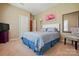Comfortable bedroom with light, neutral carpeting and decor at 3106 Crosswind Dr, Fort Mill, SC 29707
