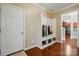 Welcoming entryway with hardwood floors, a storage bench, and a convenient coat rack at 3106 Crosswind Dr, Fort Mill, SC 29707