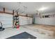 A spacious garage with an open overhead door and shelves for storage at 3106 Crosswind Dr, Fort Mill, SC 29707