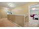 Hallway with neutral carpeting leading to bedrooms at 3106 Crosswind Dr, Fort Mill, SC 29707