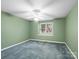 Lovely bedroom with carpet, a ceiling fan and a window, offering serene views and natural light at 3327 Archdale Dr, Charlotte, NC 28210