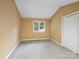 Cozy bedroom with neutral walls, carpet floors, and closet at 3327 Archdale Dr, Charlotte, NC 28210