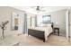 Bedroom featuring large window, closet, and ceiling fan at 3615 Maple Glenn Ln, Charlotte, NC 28226