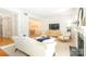 Spacious living room with a fireplace, neutral tones, and lots of seating at 3615 Maple Glenn Ln, Charlotte, NC 28226