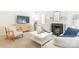 Bright living room boasts a fireplace, entertainment center, and comfortable seating at 3615 Maple Glenn Ln, Charlotte, NC 28226