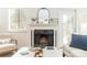 Stylish living room features a fireplace, bright window, and neutral decor at 3615 Maple Glenn Ln, Charlotte, NC 28226