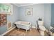 Charming bathroom with a vintage clawfoot tub and classic fixtures creating a relaxing atmosphere at 408 S Ellis St, Salisbury, NC 28144