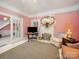 Inviting living room featuring a fireplace, vintage decor, and ample natural light at 408 S Ellis St, Salisbury, NC 28144