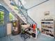 Convenient mudroom with a utility sink, stairs, and storage for added functionality at 408 S Ellis St, Salisbury, NC 28144