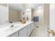 Bright bathroom with dual sinks, a large mirror, and good lighting at 4460 Coventry Row Ct, Charlotte, NC 28270