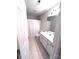 Clean bathroom featuring white cabinetry, a shower with a curtain, and tile flooring at 4460 Coventry Row Ct, Charlotte, NC 28270