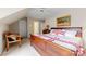 Bedroom with with a large bed, window, chair and light colored carpet at 4460 Coventry Row Ct, Charlotte, NC 28270