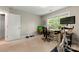 Home gym featuring light paint, carpet, and a window for natural light at 4460 Coventry Row Ct, Charlotte, NC 28270