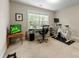 Home gym featuring light paint, carpet, and a window for natural light at 4460 Coventry Row Ct, Charlotte, NC 28270
