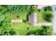 Aerial view of property, showcasing its expansive lot and lush surrounding landscape at 518 W School St, Maiden, NC 28650