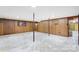 Unfinished basement with wood paneling offers potential for customization and additional living space at 518 W School St, Maiden, NC 28650