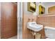 Bathroom featuring a tile shower and a sink at 518 W School St, Maiden, NC 28650
