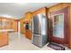Stainless steel refrigerator and built-in oven and microwave in eat-in kitchen at 518 W School St, Maiden, NC 28650