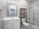 Bathroom with vanity and shower over bath at 5617 Fairview Rd # 9, Charlotte, NC 28209