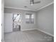 Bedroom with access to the balcony and large window at 5617 Fairview Rd # 9, Charlotte, NC 28209