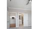 Interior view showcasing the open layout of the home with a glimpse of the kitchen and bathroom at 5617 Fairview Rd # 9, Charlotte, NC 28209