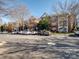 Exterior view of the complex and parking, offering convenience for residents at 5617 Fairview Rd # 9, Charlotte, NC 28209