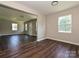 Bright, open living space with wood floors and modern recessed lighting at 6225 Macon St, Charlotte, NC 28208