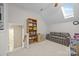 Bonus room with skylight, bookcase and lounge space - ready for new activities at 6533 Derby Nw Ln, Concord, NC 28027