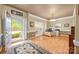 Bright home office with hardwood floors, a large window, and ample workspace at 6533 Derby Nw Ln, Concord, NC 28027