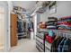 Spacious walk-in closet with ample shelving and hanging space for organization at 6533 Derby Nw Ln, Concord, NC 28027