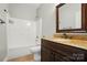 Bathroom featuring granite countertop and a shower-tub combination at 6618 Alexander Rd, Charlotte, NC 28270