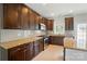The kitchen boasts granite countertops, stainless steel appliances, and lots of cabinet space at 6618 Alexander Rd, Charlotte, NC 28270