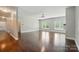 An open-concept living area with hardwood floors and plenty of natural light showcases the beautiful interior at 6618 Alexander Rd, Charlotte, NC 28270