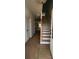 Bright foyer featuring stairs, a wooden banister, and natural light streaming in at 725 Sirius Ln # 90, York, SC 29745