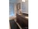 Elegant bathroom features a double vanity, tub, and marble tile surround at 746 Sinclair Dr, Monroe, NC 28112