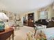 Inviting living room with custom built-ins, a piano, and comfortable seating at 828 Colville Rd, Charlotte, NC 28207