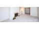 Bright living room with fireplace, built-in shelving, and neutral carpeting offering a cozy atmosphere at 8356 Meadow Lakes Dr, Charlotte, NC 28210