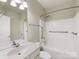 Bright bathroom featuring a white vanity, large mirror, and a white bathtub with shower at 8603 Robinson Meadow Ct, Charlotte, NC 28277