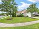 Inviting home with lush lawn, mature trees, and manicured landscaping offers great curb appeal at 8603 Robinson Meadow Ct, Charlotte, NC 28277