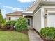 Charming home's entrance, showcasing the lush landscaping and inviting pathway to the front door at 8603 Robinson Meadow Ct, Charlotte, NC 28277