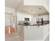 Open concept kitchen with stainless appliances, granite countertops, and white cabinets at 8603 Robinson Meadow Ct, Charlotte, NC 28277