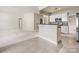 Open concept kitchen and living area in home at 8603 Robinson Meadow Ct, Charlotte, NC 28277