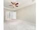 A view of the main bedroom highlighting the neutral tones and double door entryways at 8603 Robinson Meadow Ct, Charlotte, NC 28277
