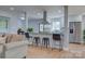 Modern kitchen with stainless steel appliances, granite countertops, a breakfast bar and a large pantry at 8607 Larchmont Cir, Charlotte, NC 28214