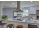Stylish kitchen featuring granite countertops, stainless steel appliances, and ample counter space at 8607 Larchmont Cir, Charlotte, NC 28214