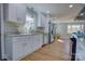 Bright kitchen boasting granite counters, stainless appliances, and generous cabinetry at 8607 Larchmont Cir, Charlotte, NC 28214