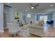 Inviting living room features neutral decor, hardwood floors, and plenty of natural light at 8607 Larchmont Cir, Charlotte, NC 28214