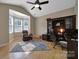Inviting home office with a bay window, hardwood floors, and traditional wooden furniture at 909 Autumn Glen Ct, Lake Wylie, SC 29710