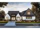 Stunning exterior view of a modern two-story home featuring a manicured lawn and contemporary design at 0000 Woodhill Cove Ln # 5, Denver, NC 28037